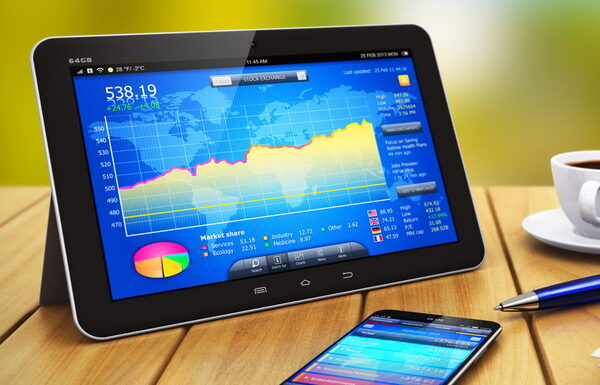 Tablet displaying bar graph placed next to cup of coffee, ballpoint pen and smartphone