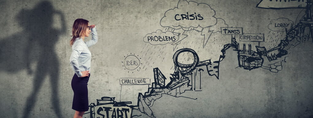 Business career challenges concept. Businesswoman imagining to be a super hero looking aspired making career plans